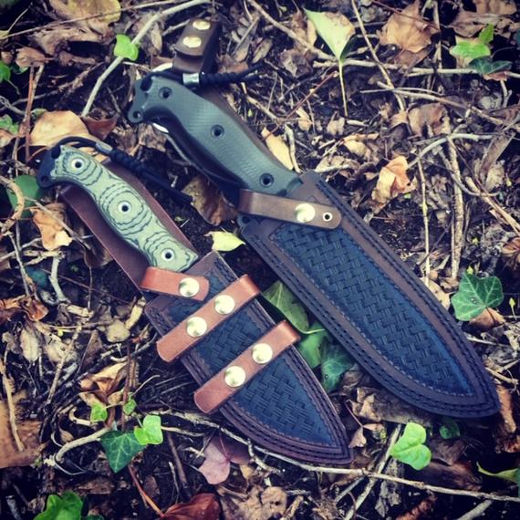 Custom leather sheaths for Busse Combat knives. Also made for all Busse kin knives.