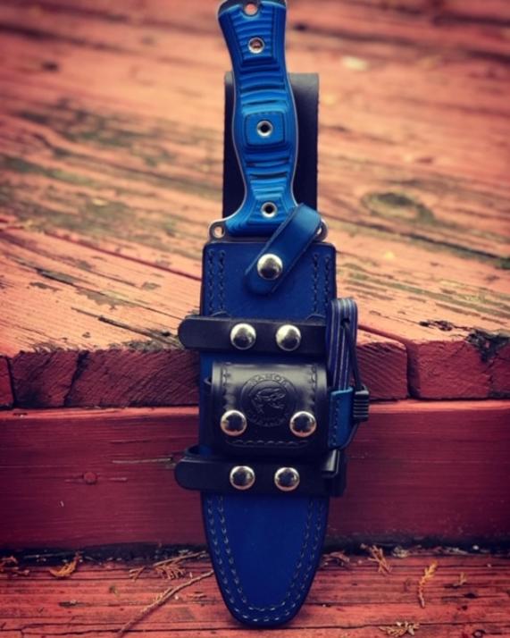 Busse Team Gemini custom, handmade sheath in blue with nickel hardware. Features utility pouch.